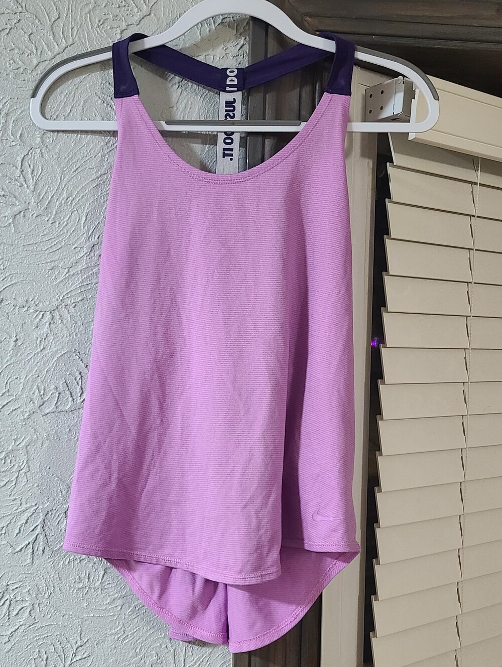 purple Nike Dri-FIT athletic tank top featuring contrasting purple "Just Do It"
